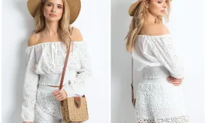 Kobieta w letniej stylizacji, z kapeluszem i plecioną torebką, emanuje swobodnym, **hippie** duchem.