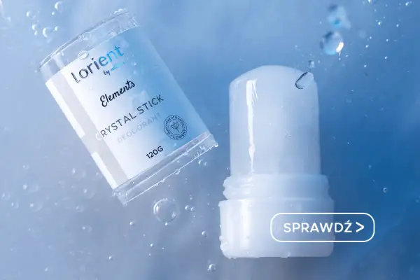 Ałun co to? Naturalny dezodorant Lorient Crystal Stick w sztyfcie, 120g, otoczony kroplami wody.